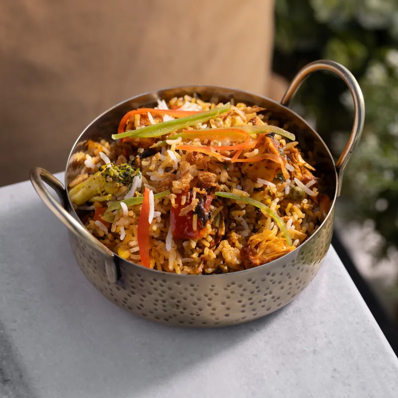 Hyderabadi Biryani — Fragrant basmati layered with vegetables, slow-cooked under dum, vegetarian Indian dish at Padharo Southampton