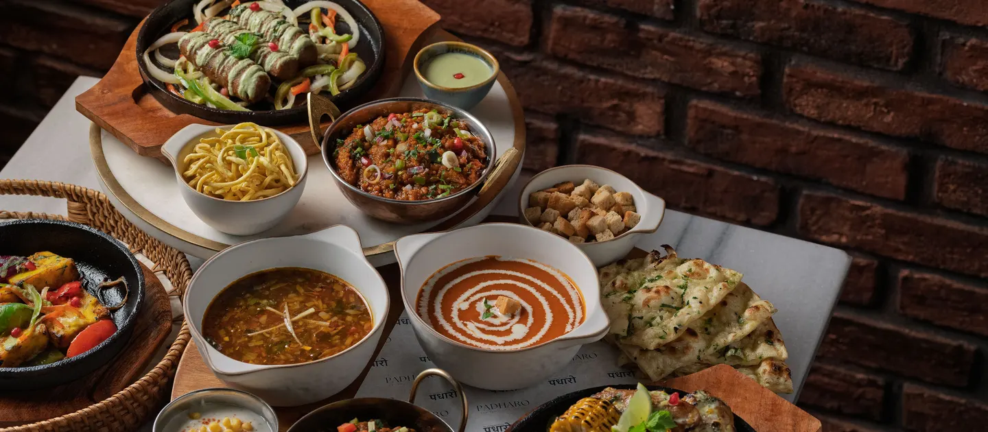 A winter table at Padharo: sizzlers, creamy tomato and manchow soups, jackfruit rogan josh, rice and naan